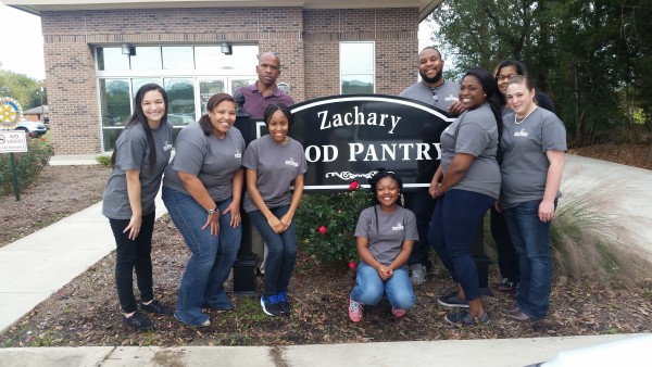 Students Standing In Front of Zachary Food Pantry