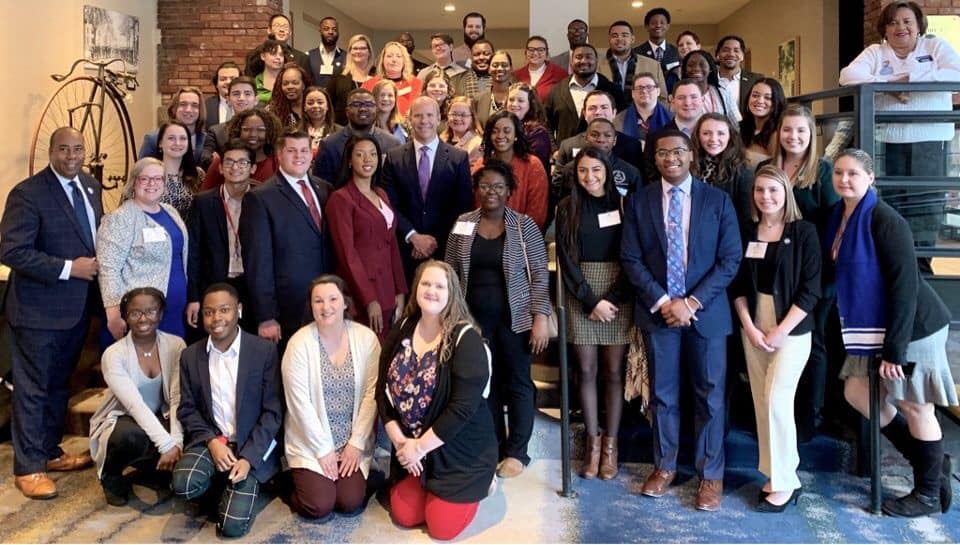 Adam Patrick and Candice Savoy pictured with students from other Louisiana universities