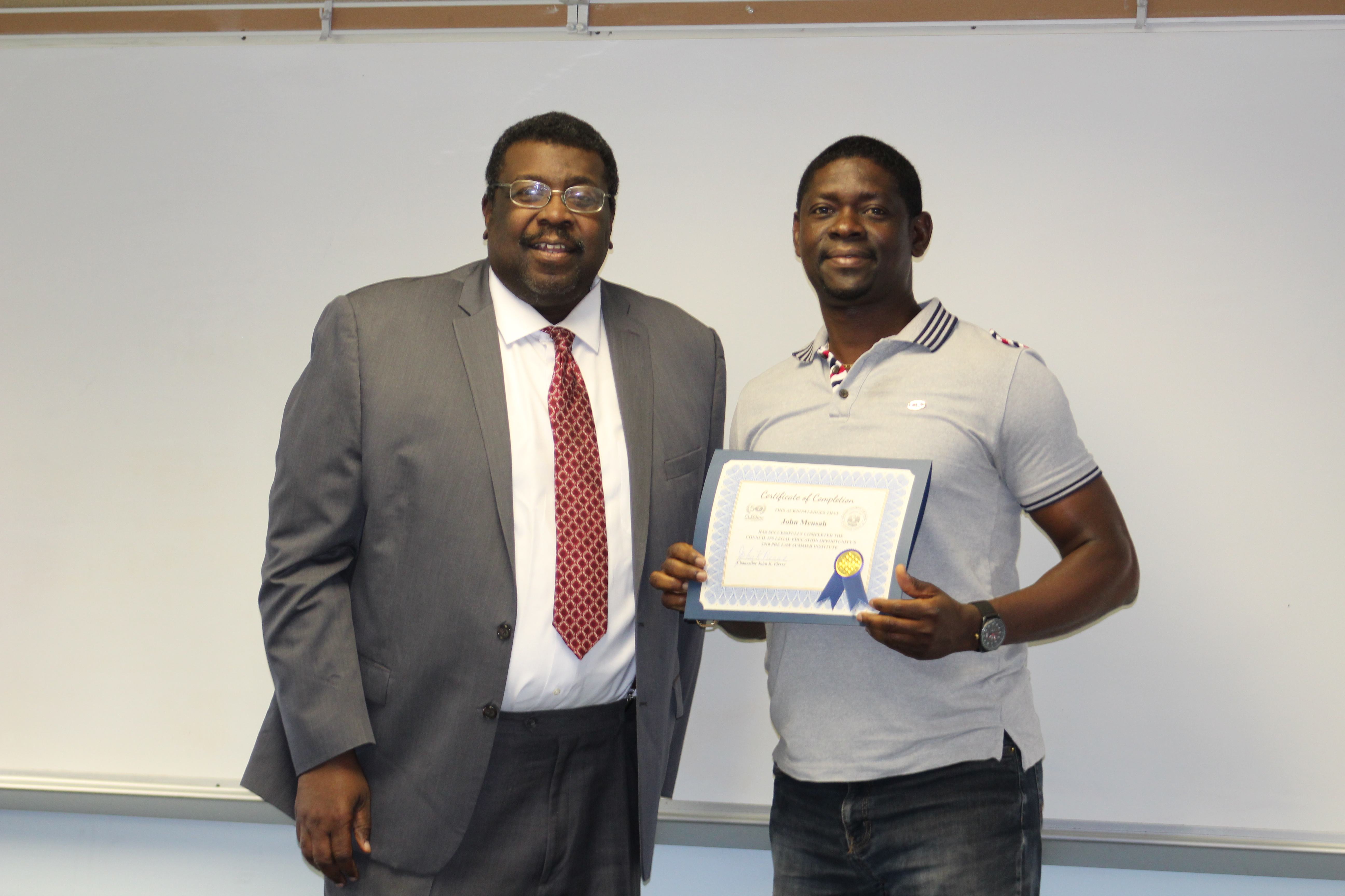 Graduates receive their certificates