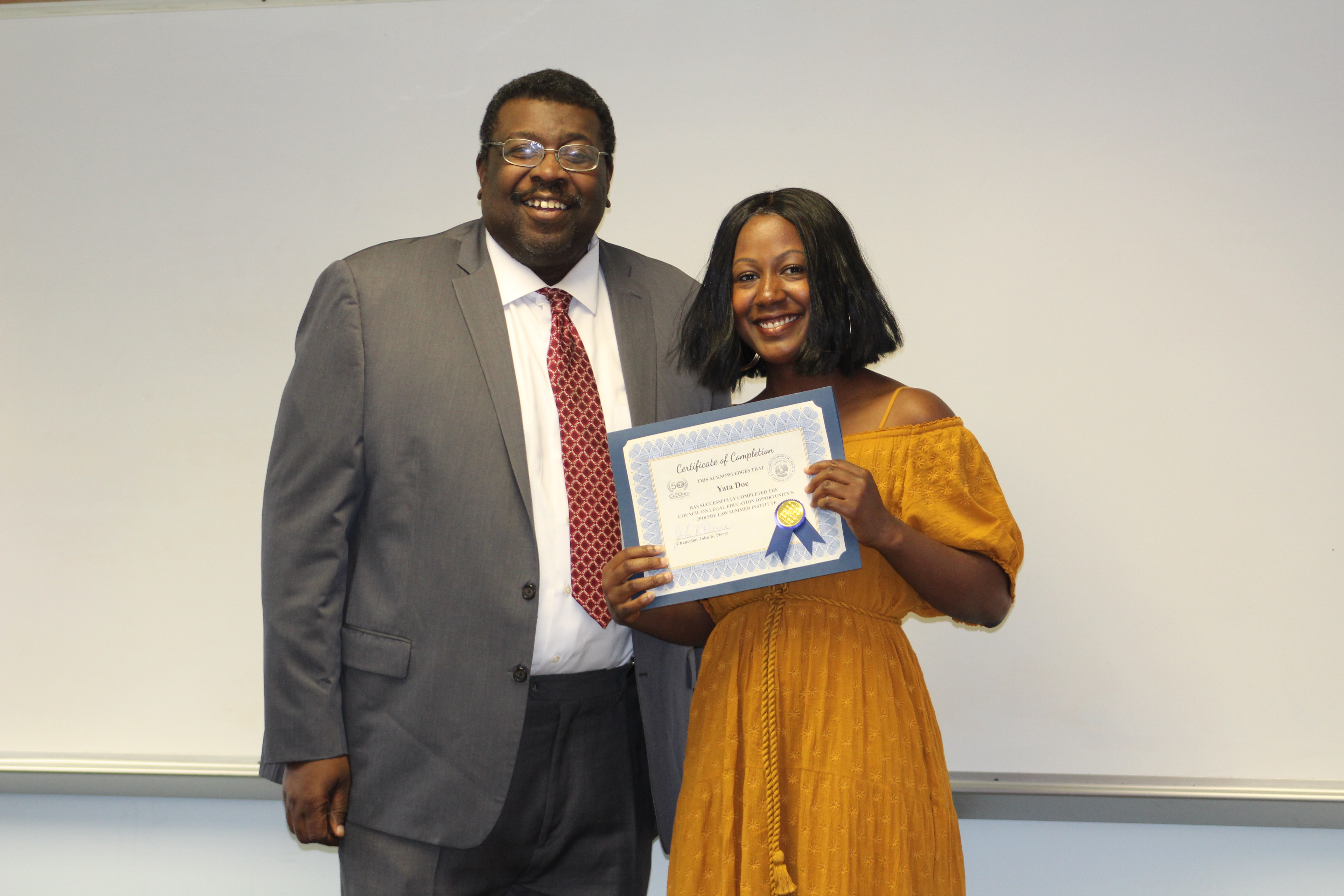 Graduate receives their certificate