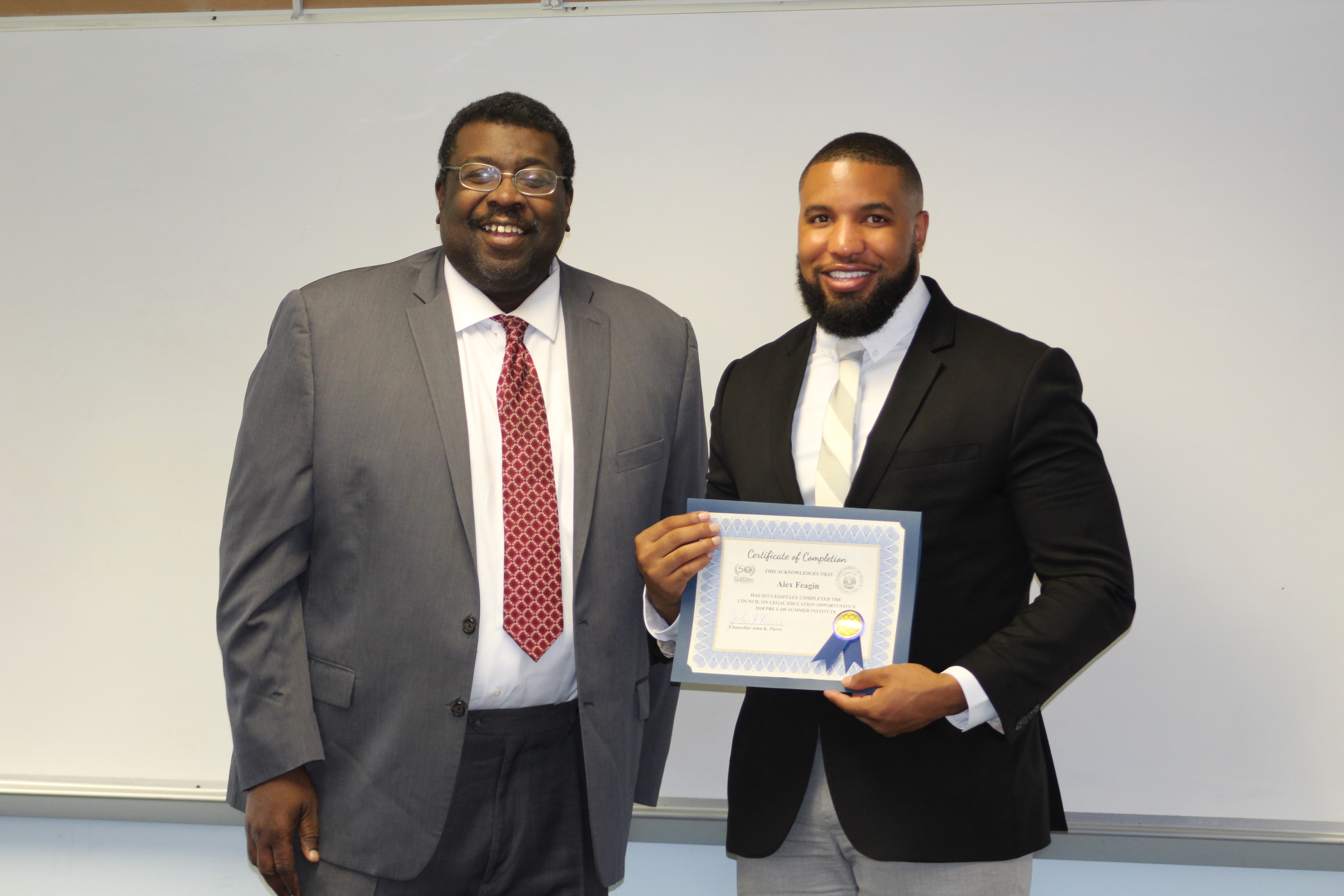 Graduate receives their certificate