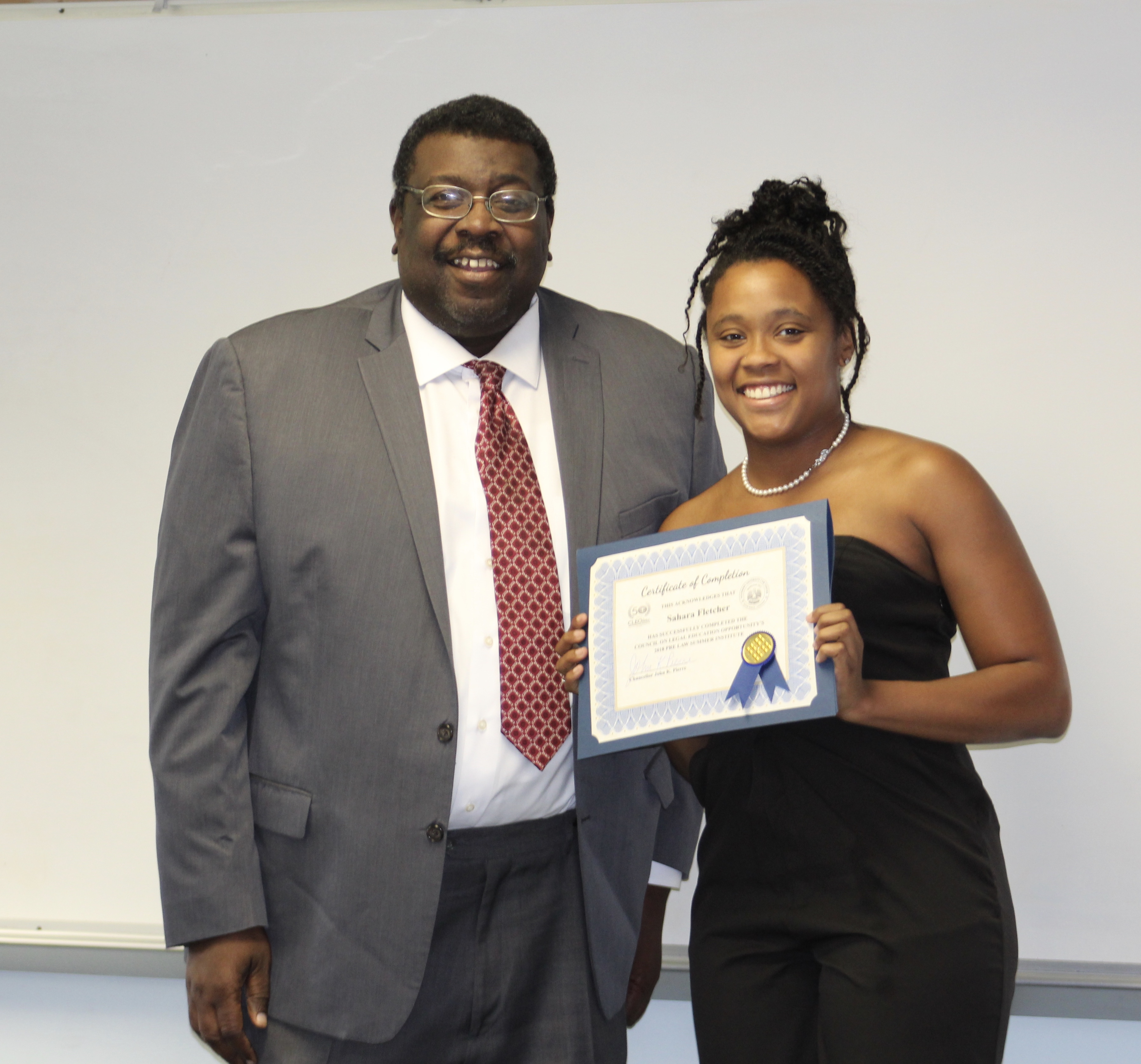 Graduate receives certificate